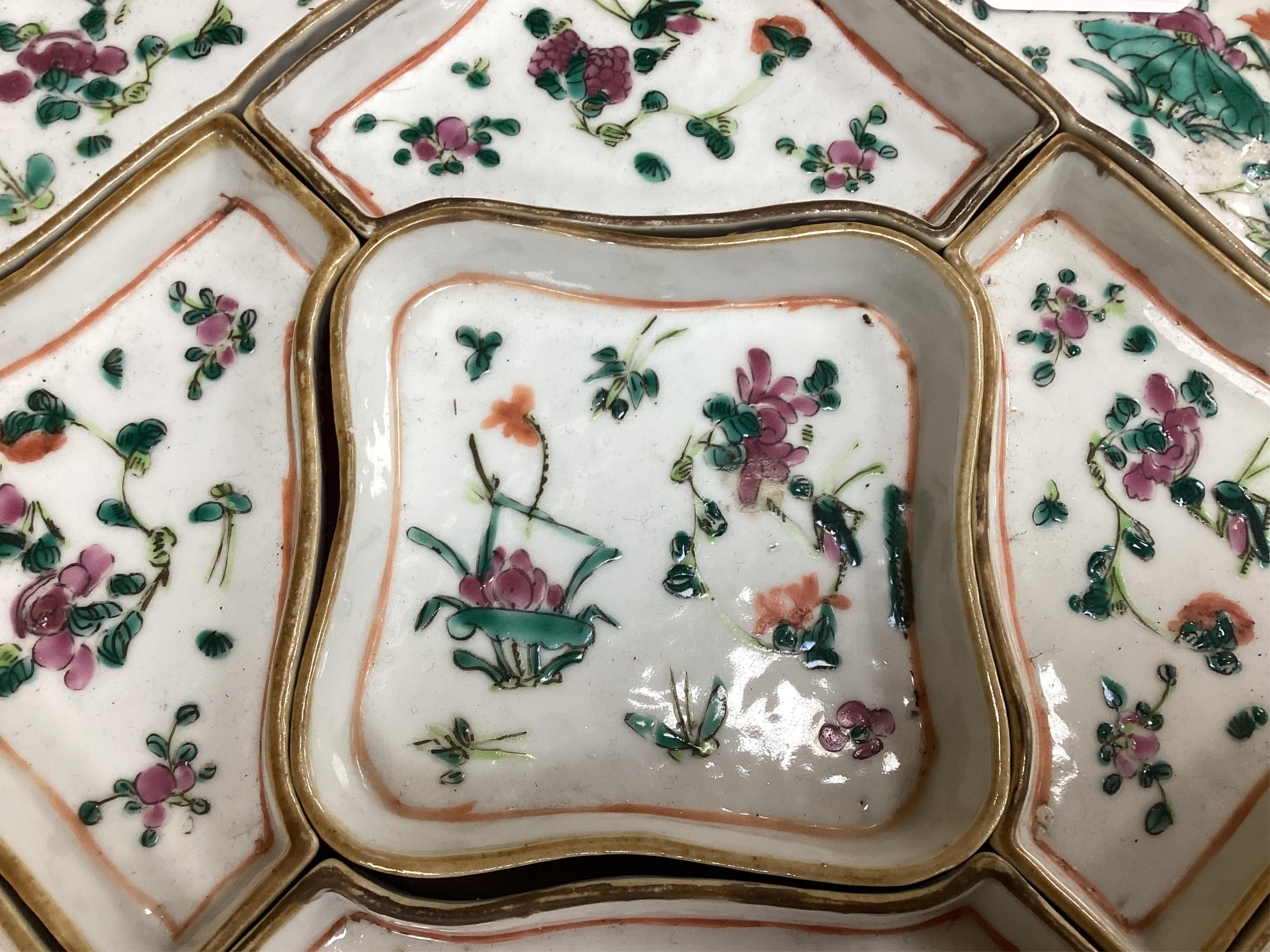 A square Chinese hardwood tray of famille rose geometric dishes, 30cm. Condition - fair to good